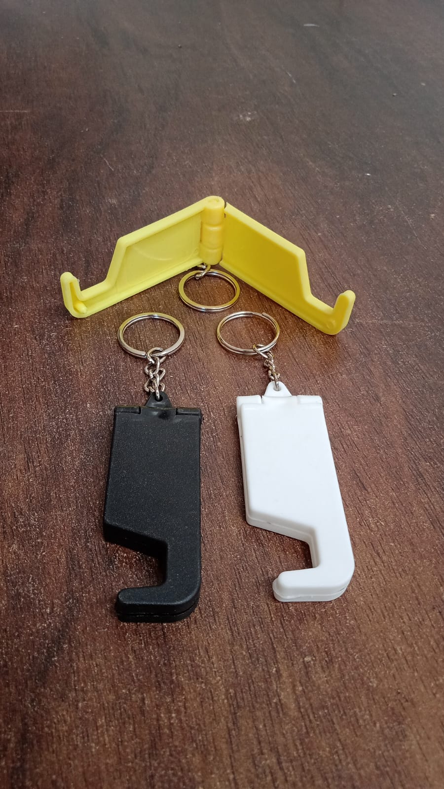 2 in 1 Plastic Keychain with Mobile Stand / Phone Holder (1 Pc / Multicolor) 2 in 1 Plastic Keychain with Mobile Stand / Phone Holder (1 Pc / Multicolor)